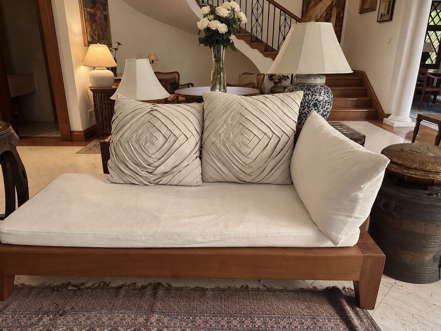 Teak daybed with pleated linen cushions